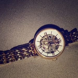 Rose gold Fossil self wind watch